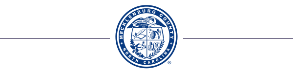 Blue circular Mecklenburg County seal