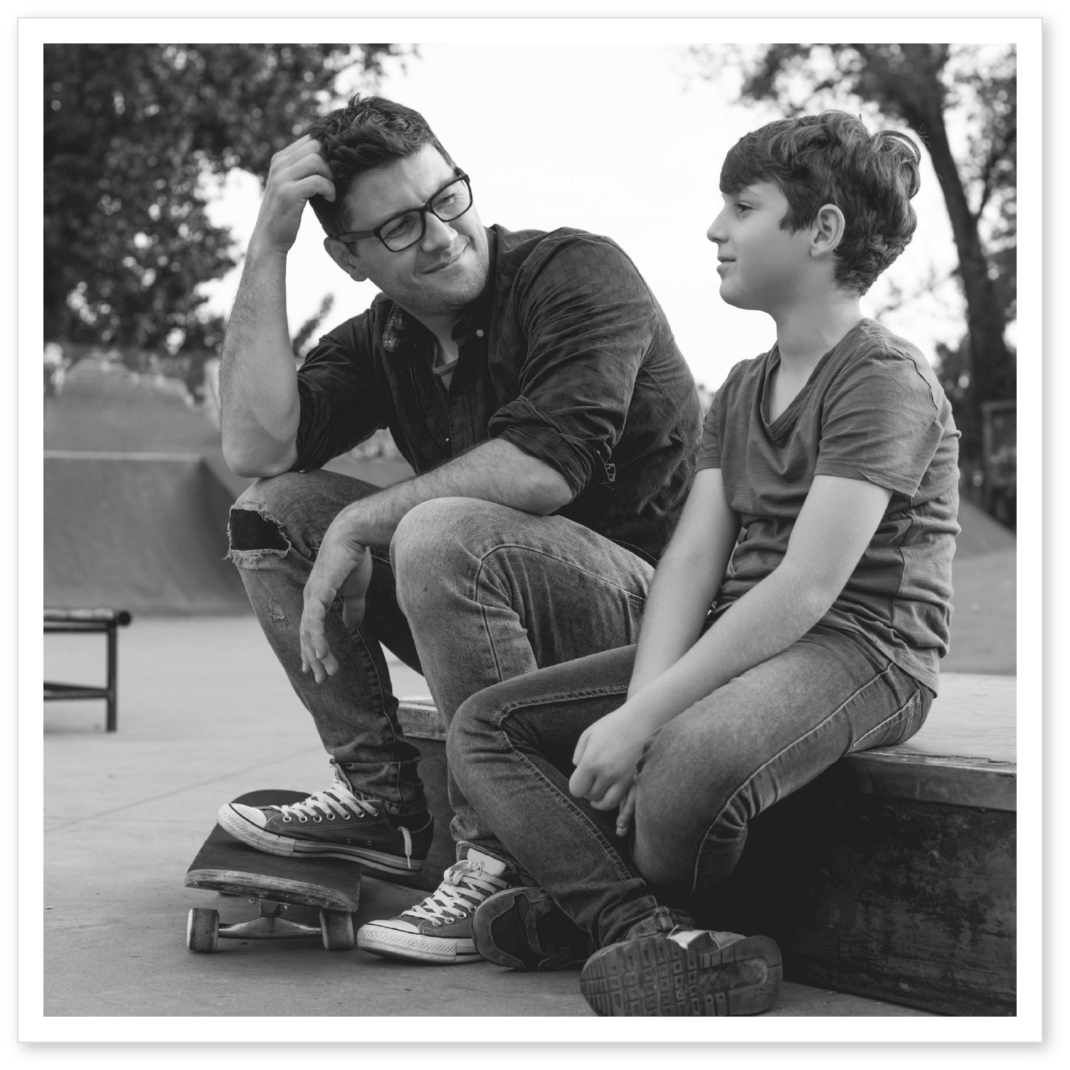 A parent and child having a conversation A parent and child having a conversation